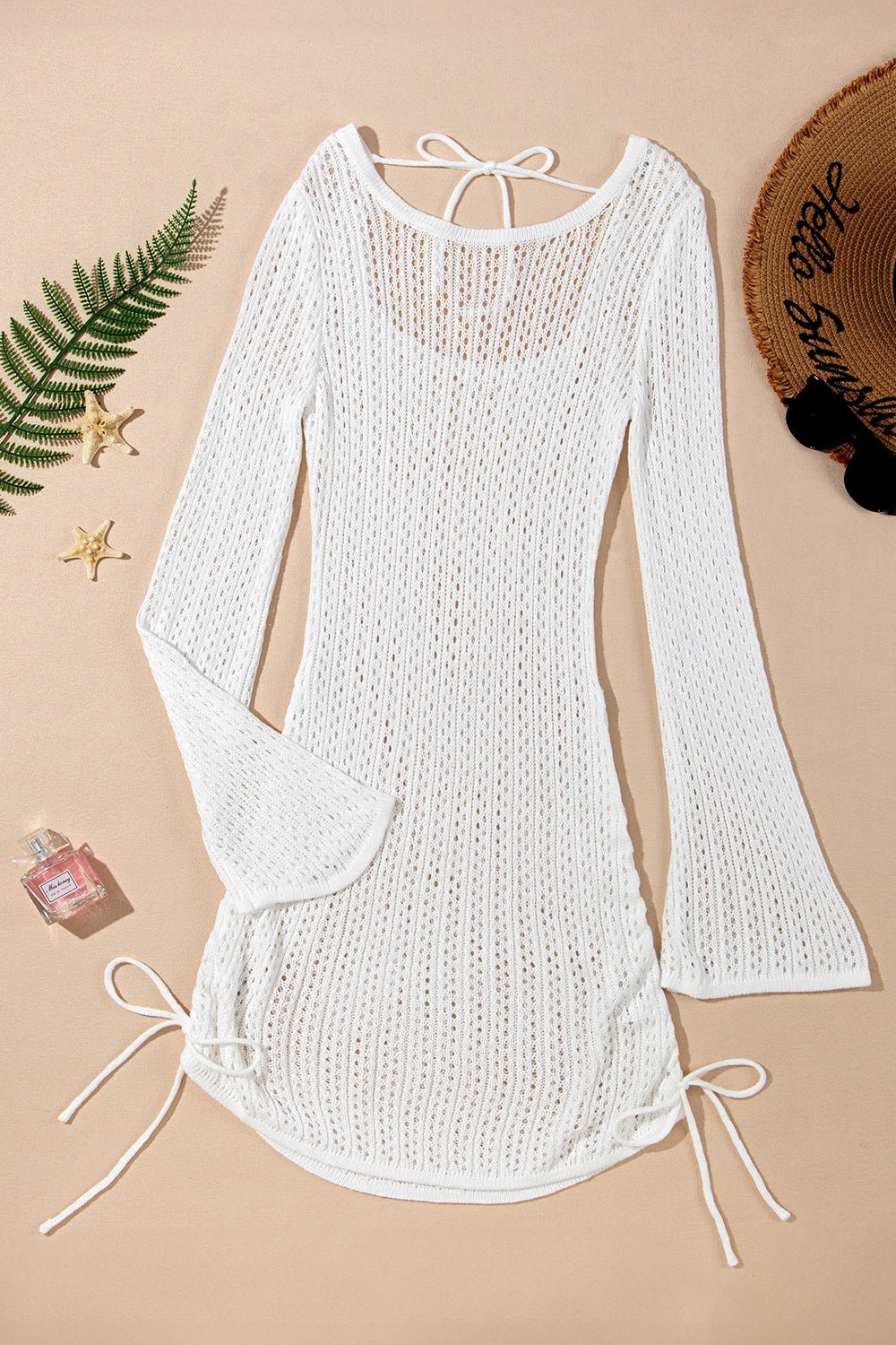 Robe cache-cœur en tricot à manches cloches ajourées et cordon de serrage - Les secrets de Cath