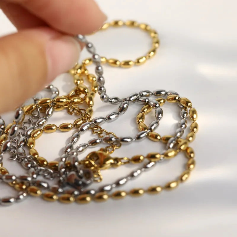 Collier de perles en acier titane - Les secrets de Cath