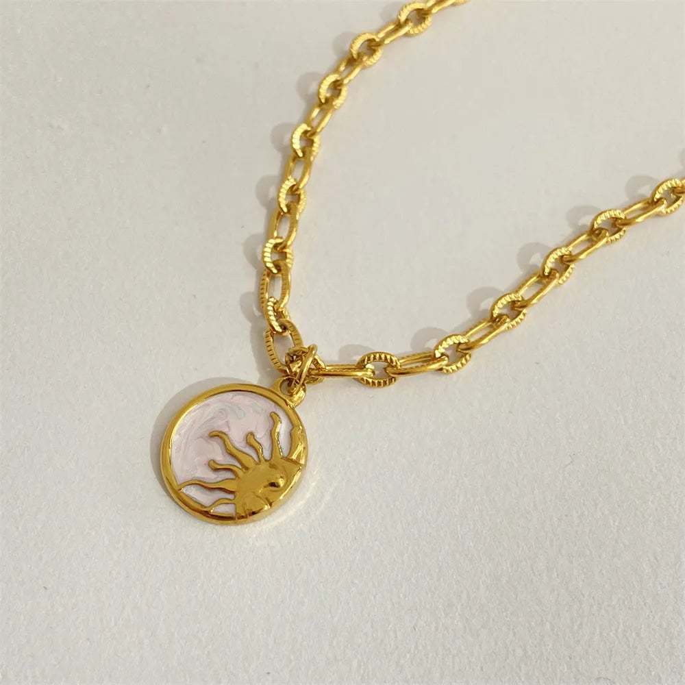 Collier Soleil et Lune en Acier Titane - Les secrets de Cath