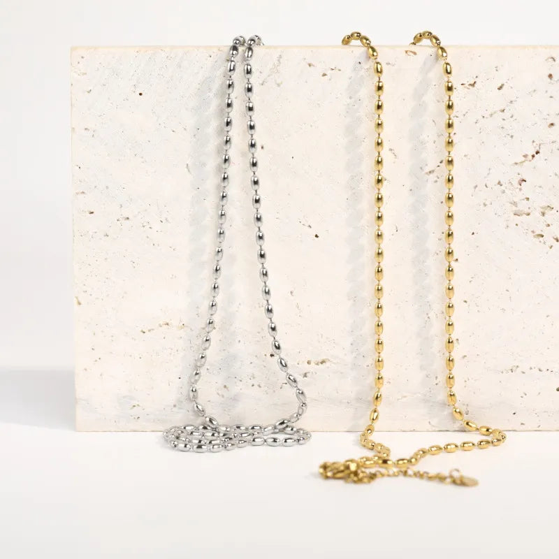 Collier de perles en acier titane - Les secrets de Cath