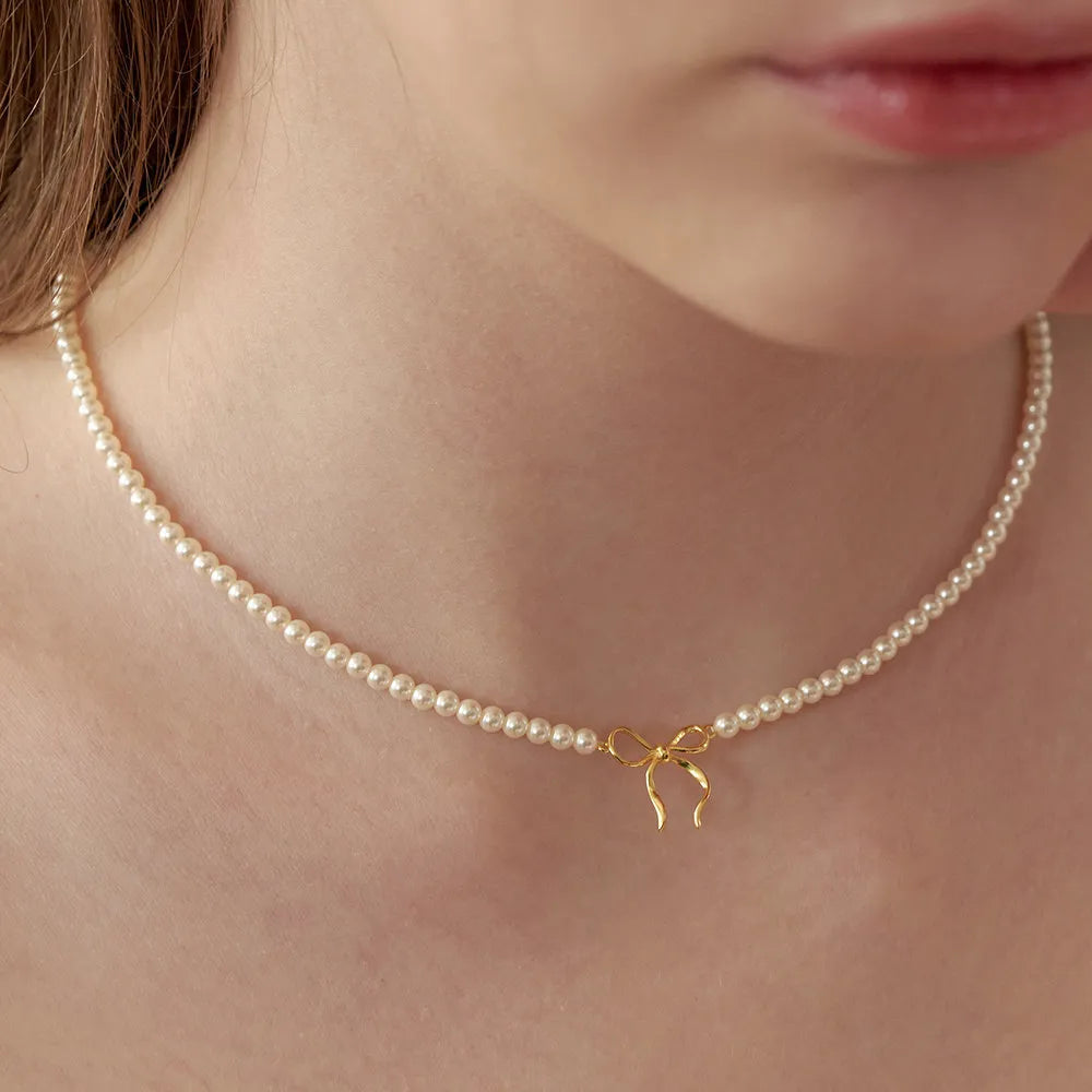 Collier nœud en perles de cuivre - Les secrets de Cath