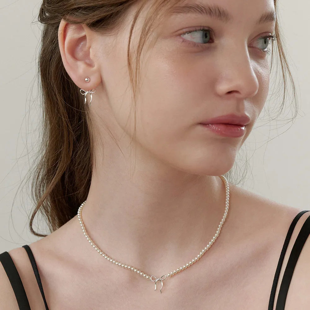 Collier nœud en perles de cuivre - Les secrets de Cath