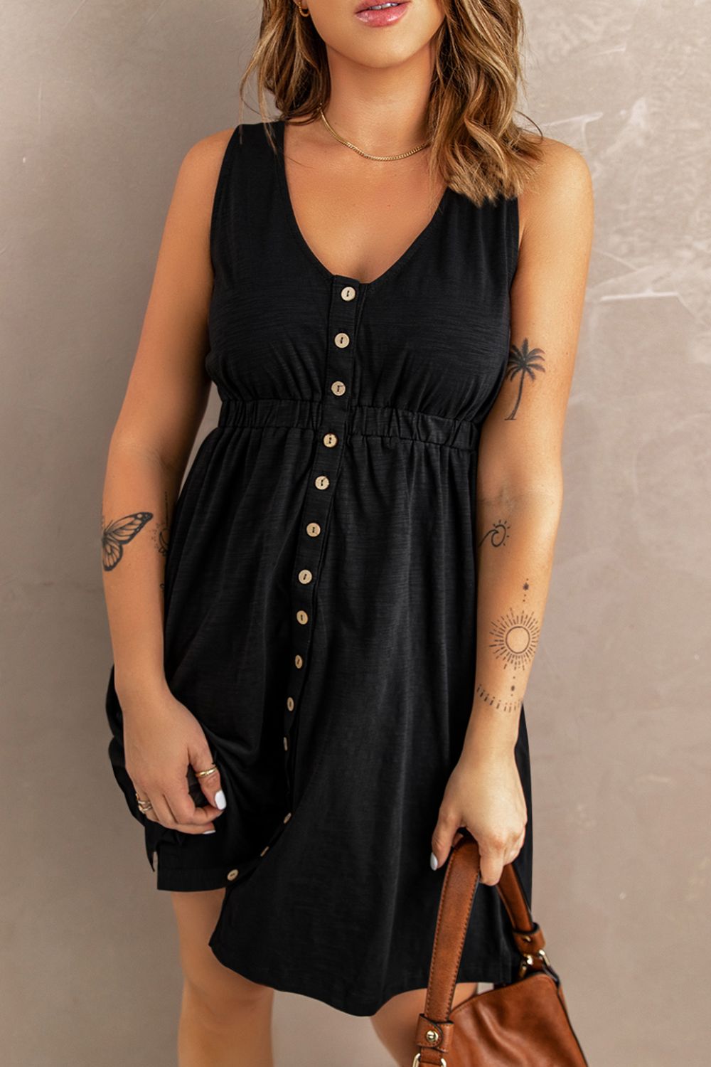 Mini-robe magique boutonnée sans manches - Les secrets de Cath