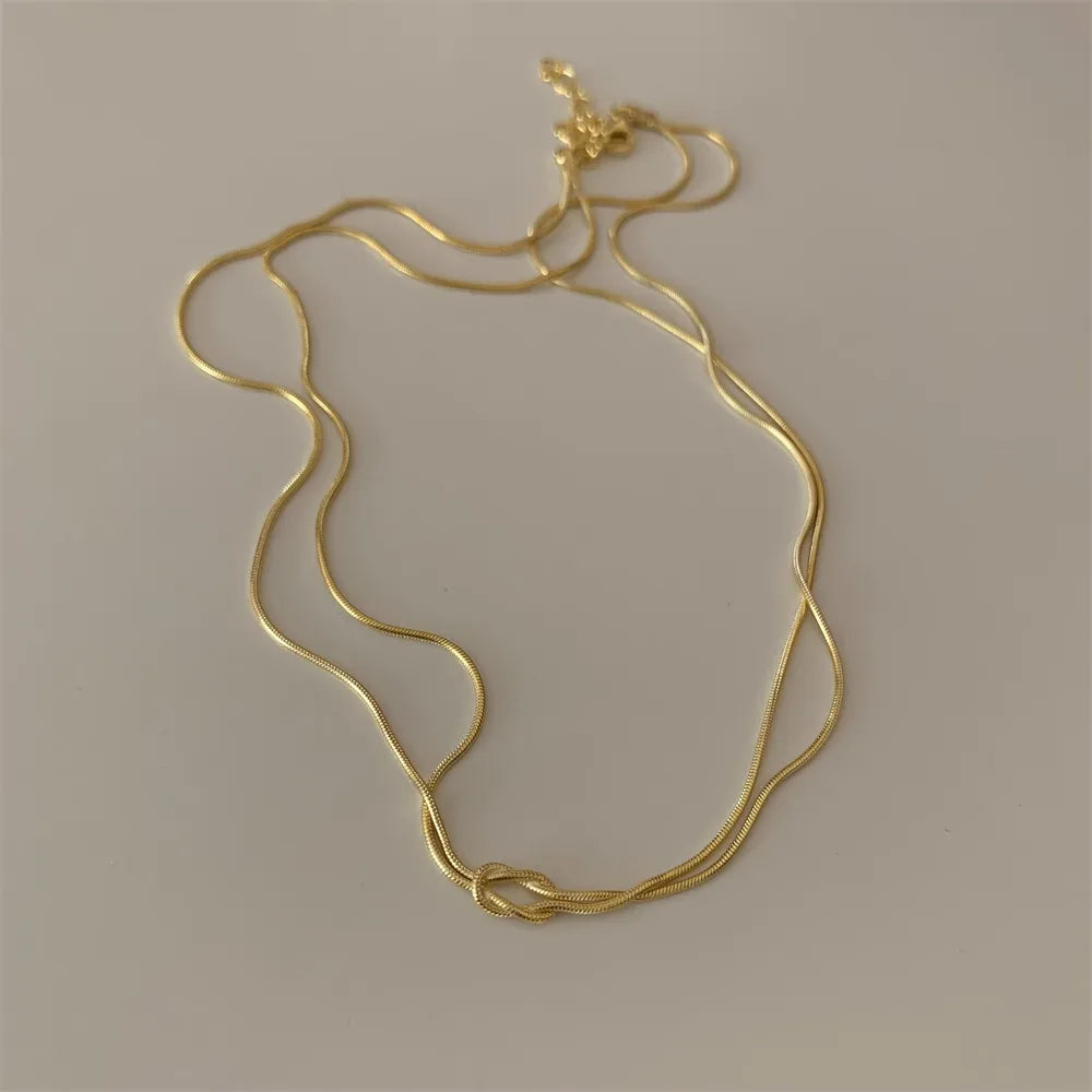 Collier noué en acier titane - Les secrets de Cath