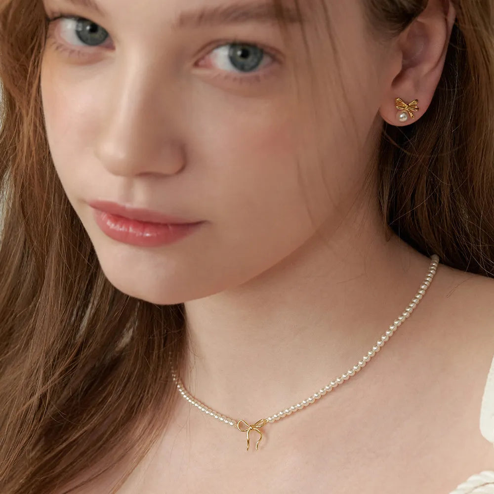 Collier nœud en perles de cuivre - Les secrets de Cath