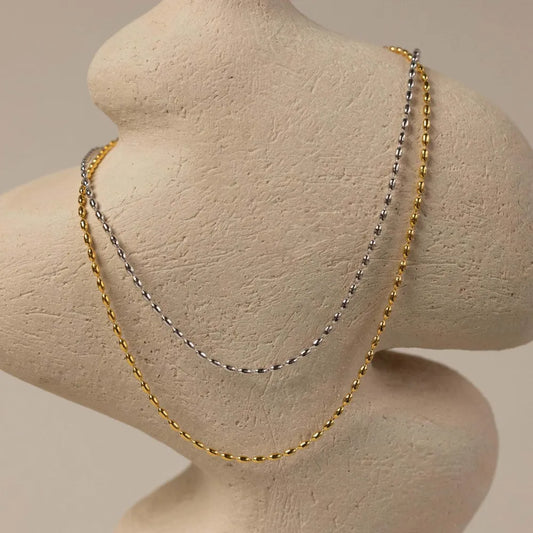 Collier de perles en acier titane - Les secrets de Cath